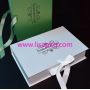 Green custom folding box with ribbon