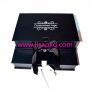 Black men's bikini gift box with white logo and ribbon 