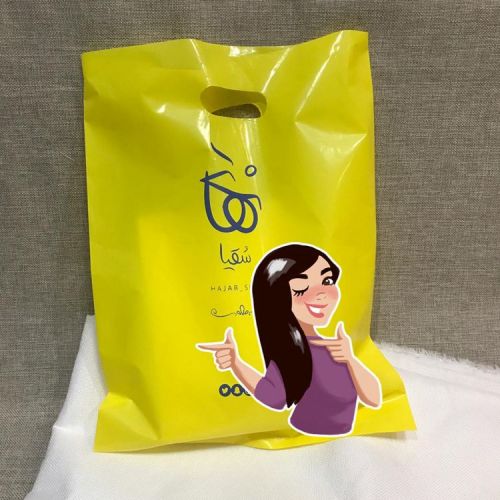 Custom yellow cheap plastic shopping bags with handle for clothing